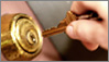 Key beng inserted into deadbolt.
